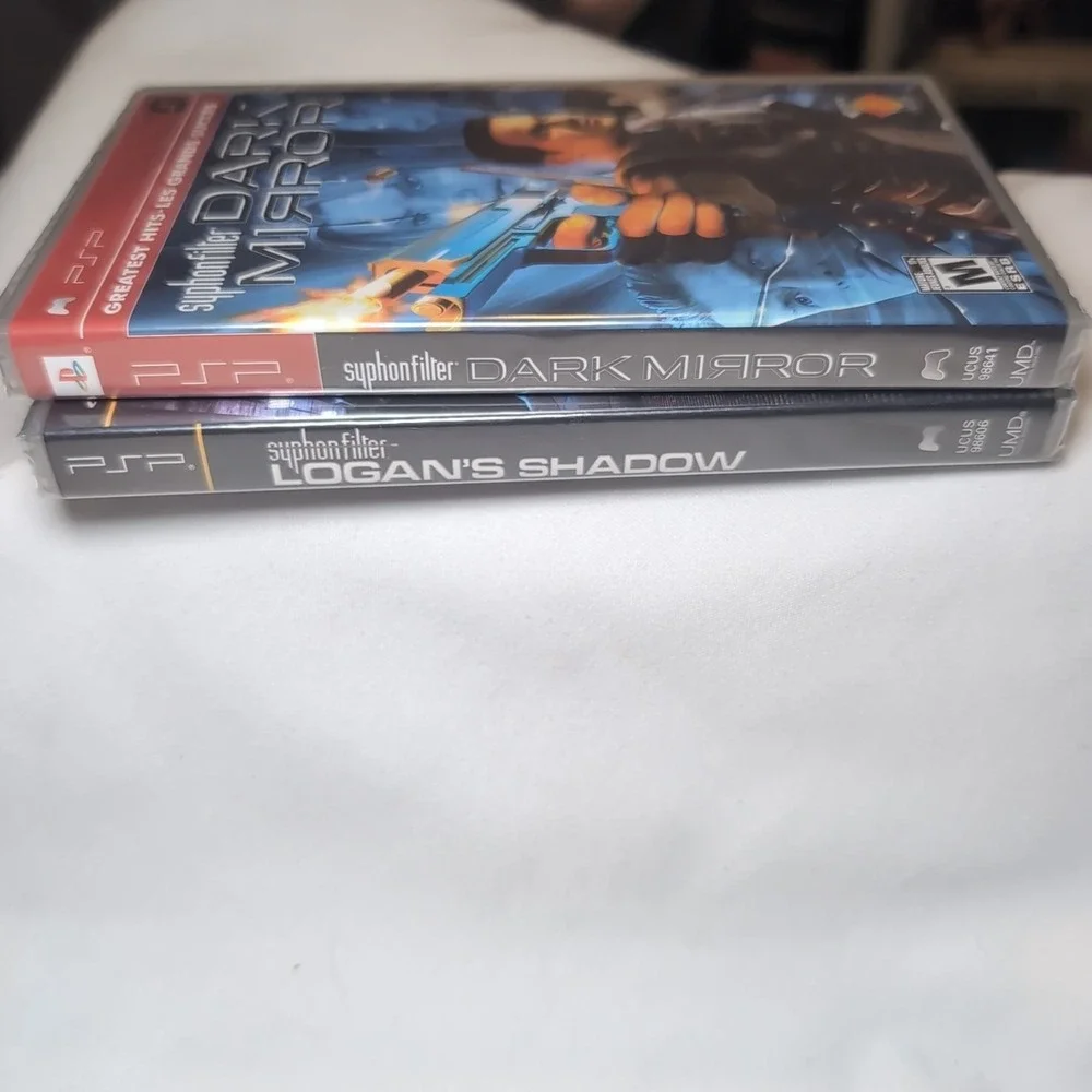NIB Sony Playstation PSP Syphon Filter Logans Shadow & Dark Mirror NEW Sealed